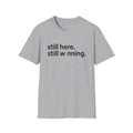 Breast Cancer Survivor Tee — "still here. still winning."